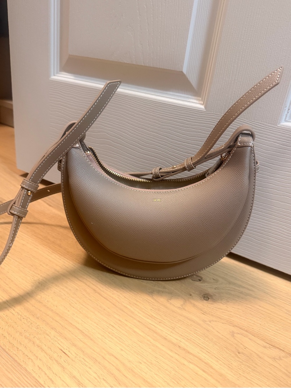JW PEI Crescent Crossbody Bag in Taupe